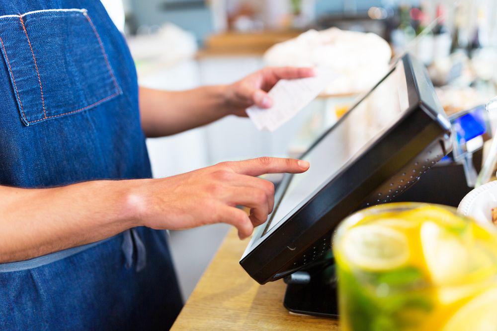 hospitality worker uses POS system to improve his business