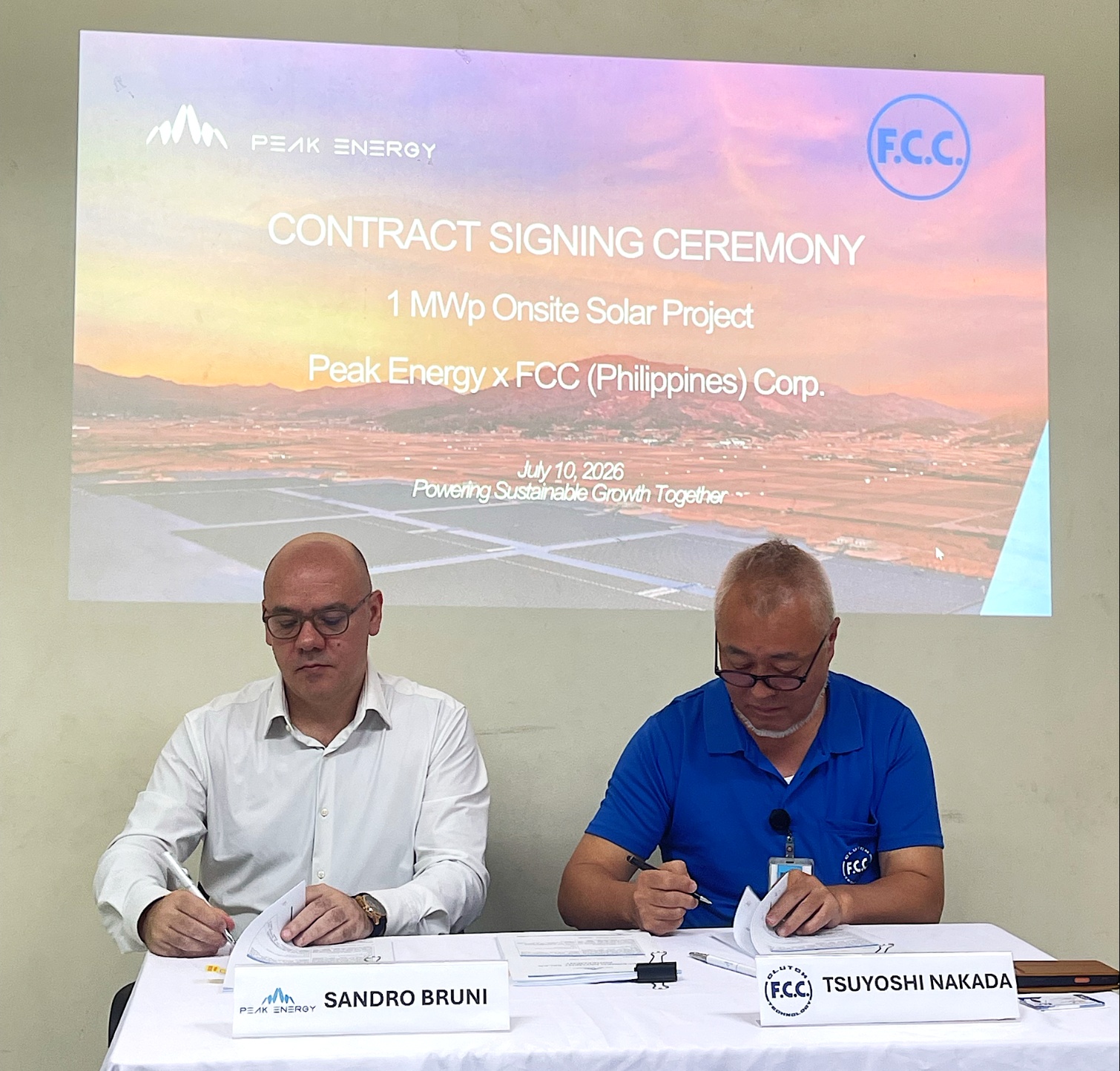 Sandro Bruni (Peak Energy) and Tsuyoshi Nakada (FCC Philippines Corporation) at the Signing Ceremony held on 10th of July